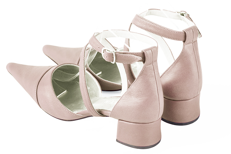 Powder pink women's open side shoes, with crossed straps. Pointed toe. Low flare heels. Rear view - Florence KOOIJMAN